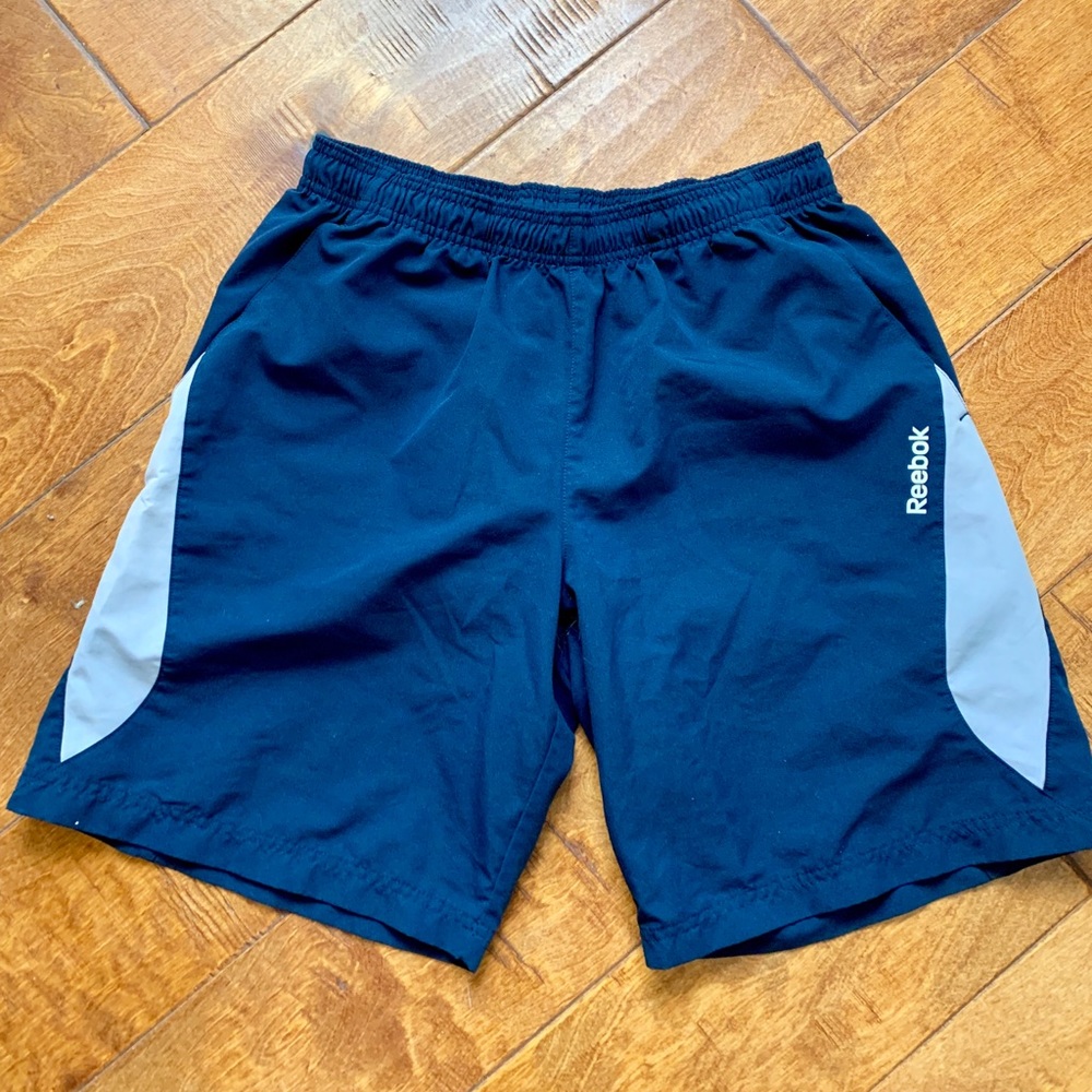 Reebok utility shorts.